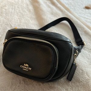 Genuine, black leather coach belt bag.